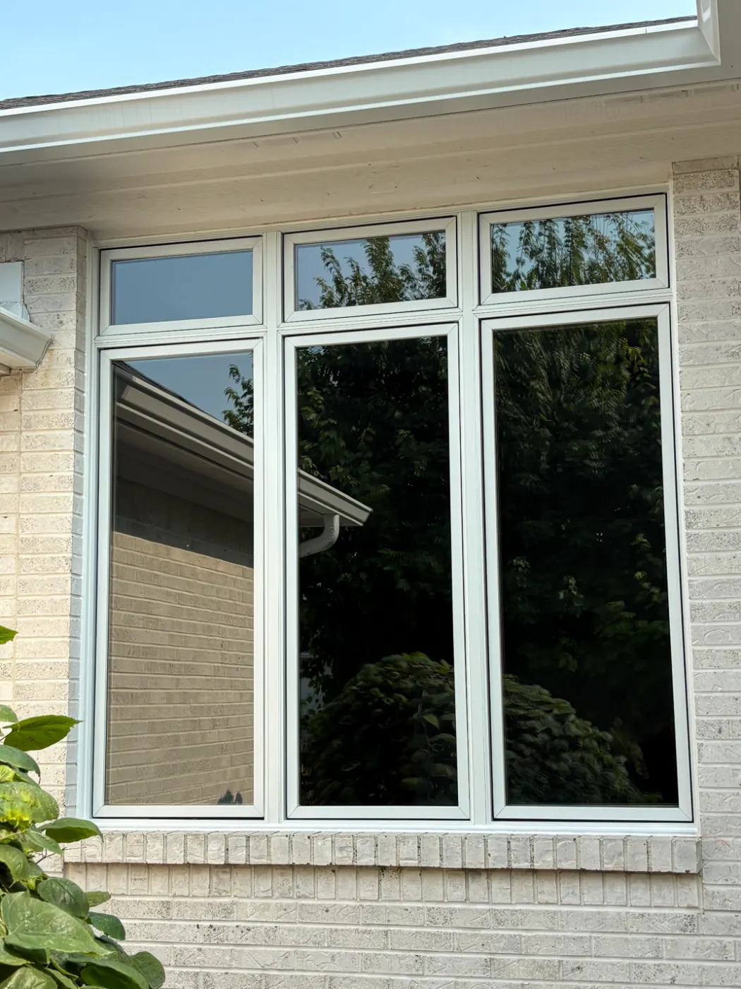 Storm-damaged window documented in Lapel